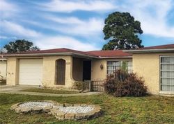 Short-sale Listing in SALISBURY DR HOLIDAY, FL 34691