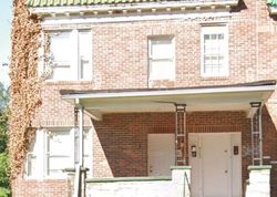 Sheriff-sale Listing in WOLCOTT AVE BALTIMORE, MD 21216