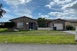 Short-sale in  PINE GARDEN LN Lake Worth, FL 33467